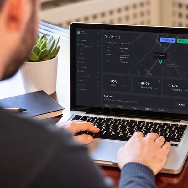 Person looking at a data dashboard on a laptop